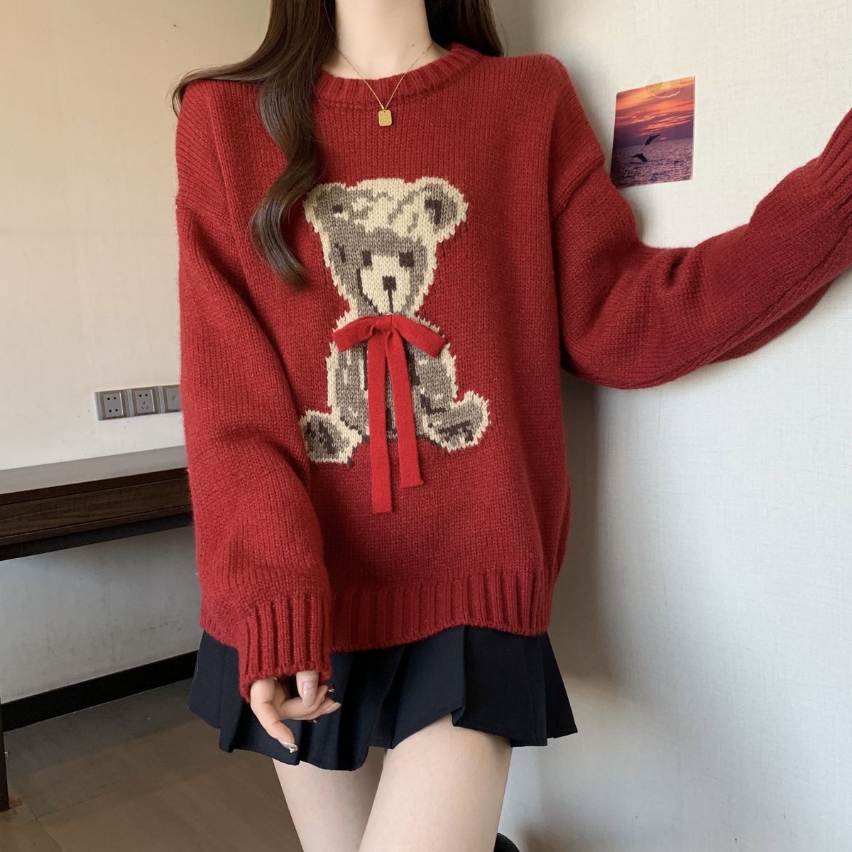 A cartoon crew neck sweater