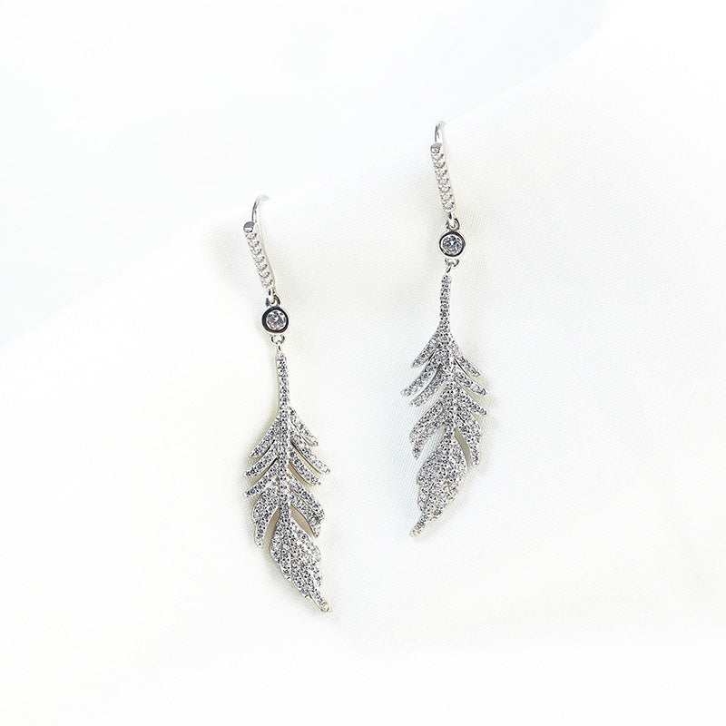 A sterling silver s925 full diamond feather earrings