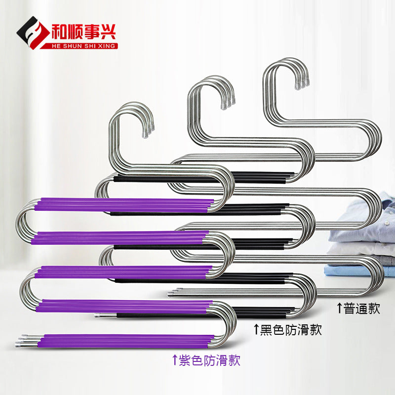 A stainless steel hollow S-shaped multi-functional pants rack, scarf, belt storage rack, super space saving