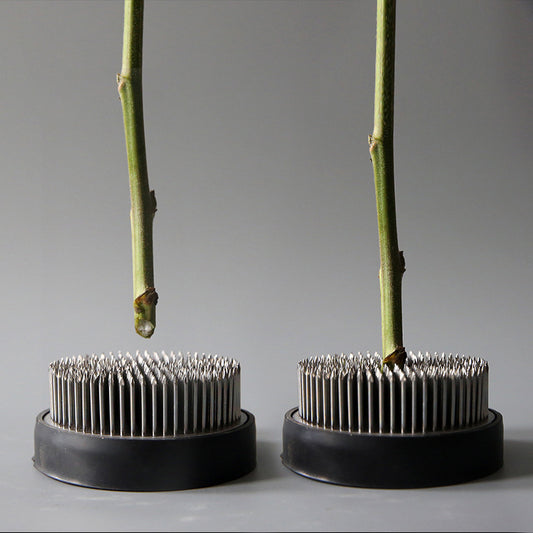 A Stainless Steel Flower Arrangement Base Needle Tool