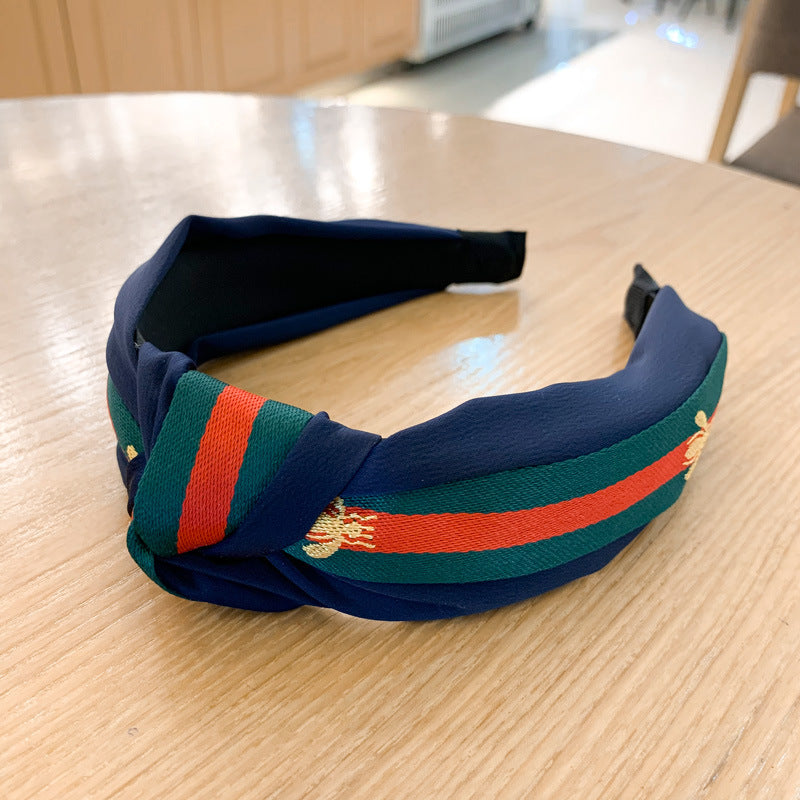 A lady bee knotted headband, Korean version, wide-sided simple headband, high cranial top stripe, wide-sided pressure headband, non-slip.