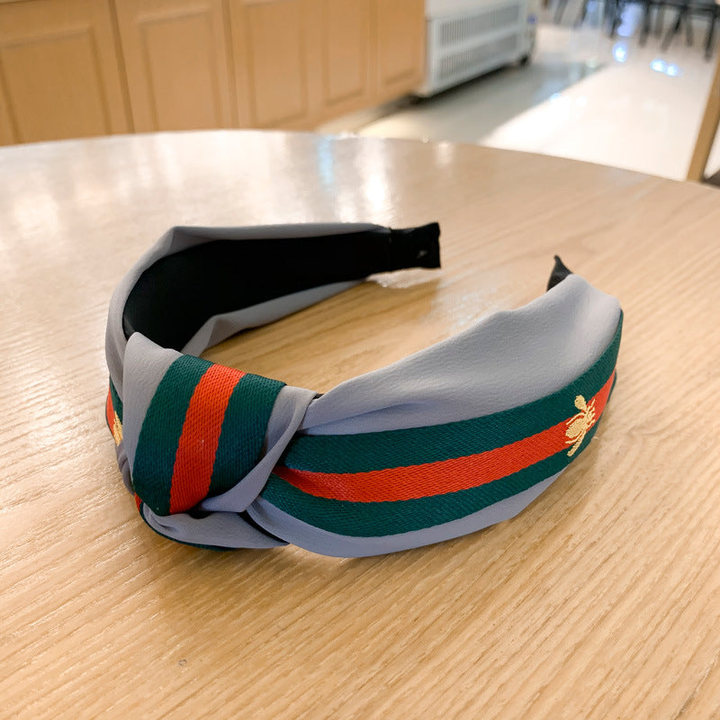 A lady bee knotted headband, Korean version, wide-sided simple headband, high cranial top stripe, wide-sided pressure headband, non-slip.