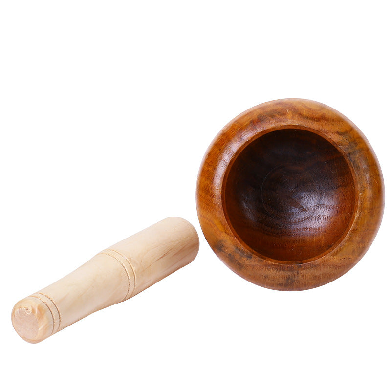 A Solid wood garlic tamper, medicine jar, wooden cup garlic puree