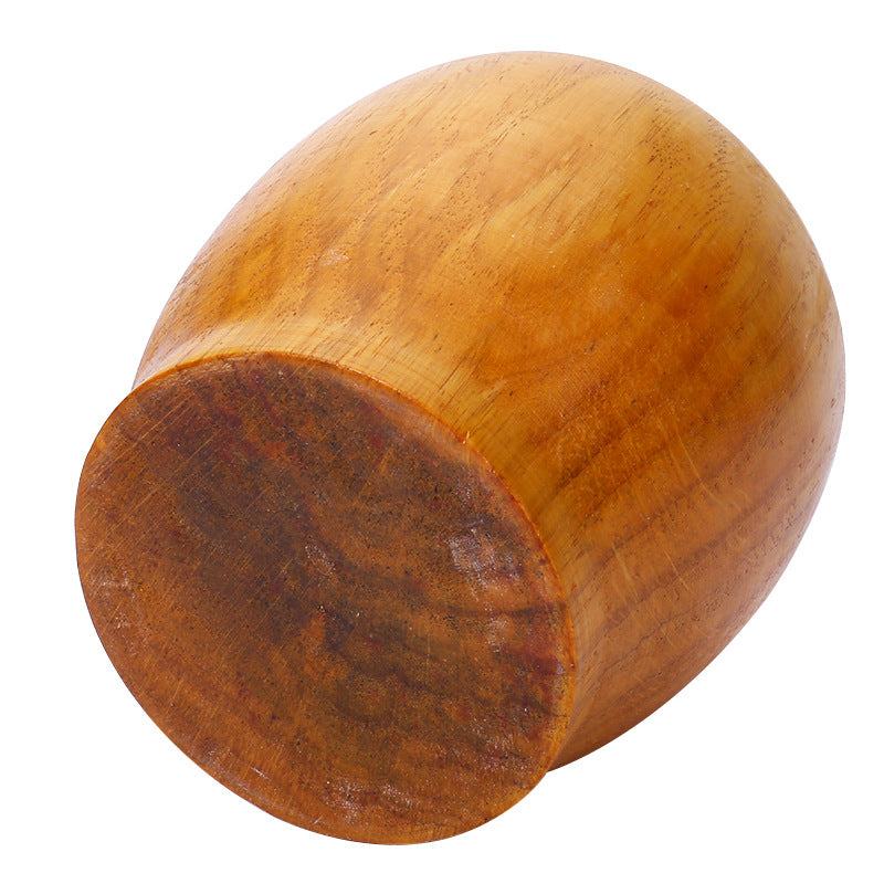 A Solid wood garlic tamper, medicine jar, wooden cup garlic puree