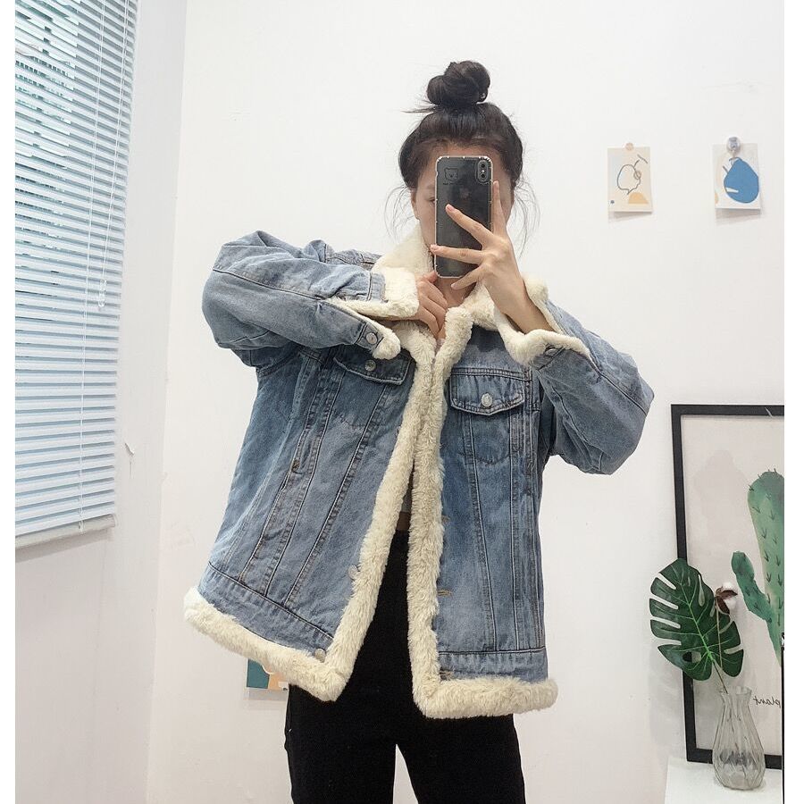 P wears denim jackets on both sides