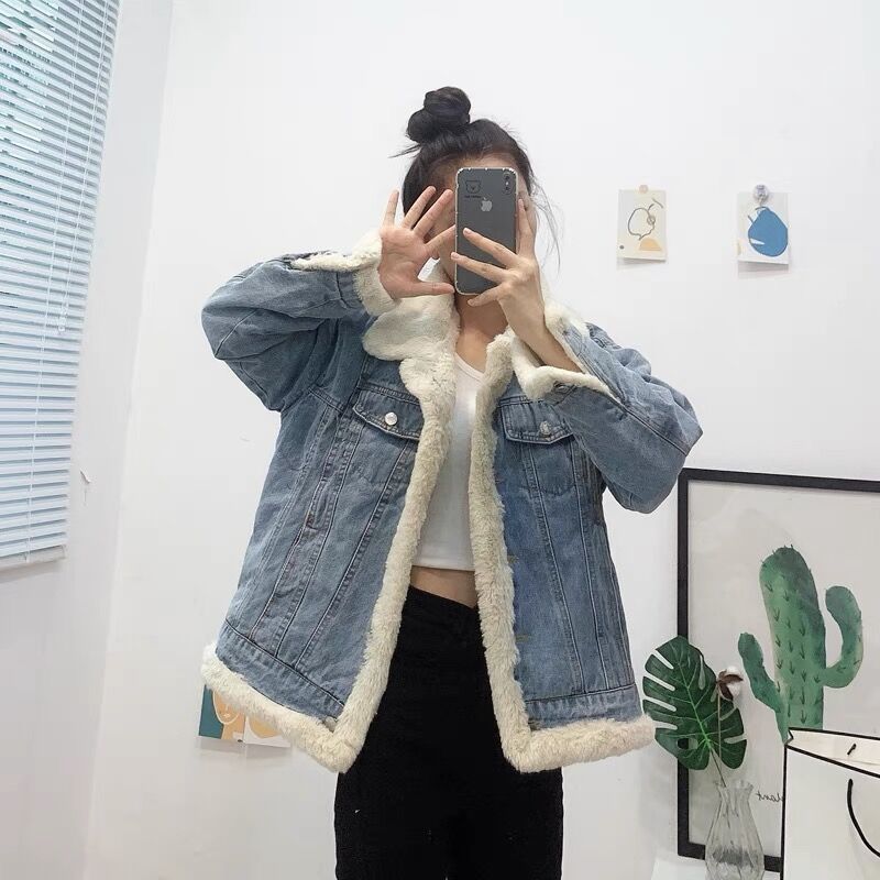 P wears denim jackets on both sides