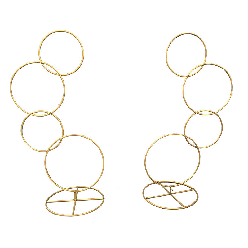 A wrought iron flower stand road guide