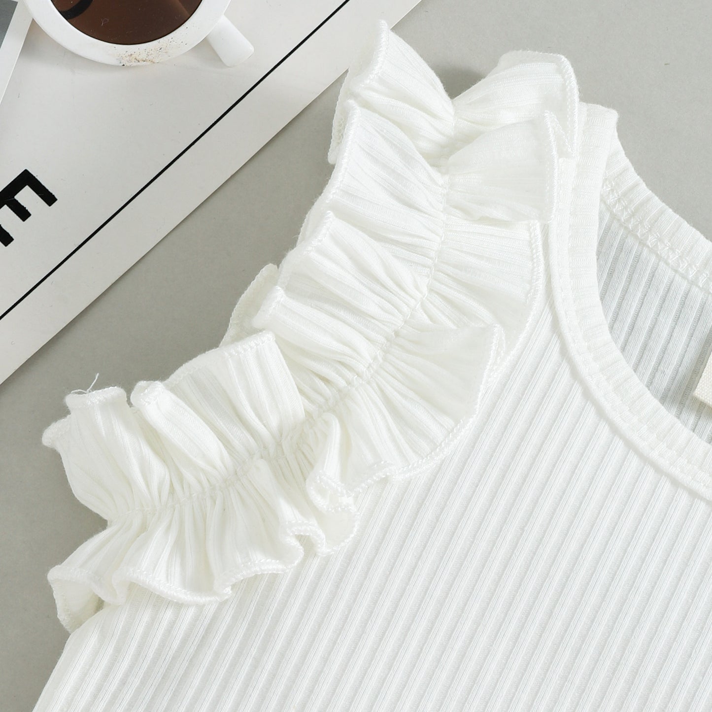 A European and American style summer small and medium-sized girl set with cotton pit strips and wooden ear edges, sleeveless top, solid color shorts, two-piece set - Mixbatch