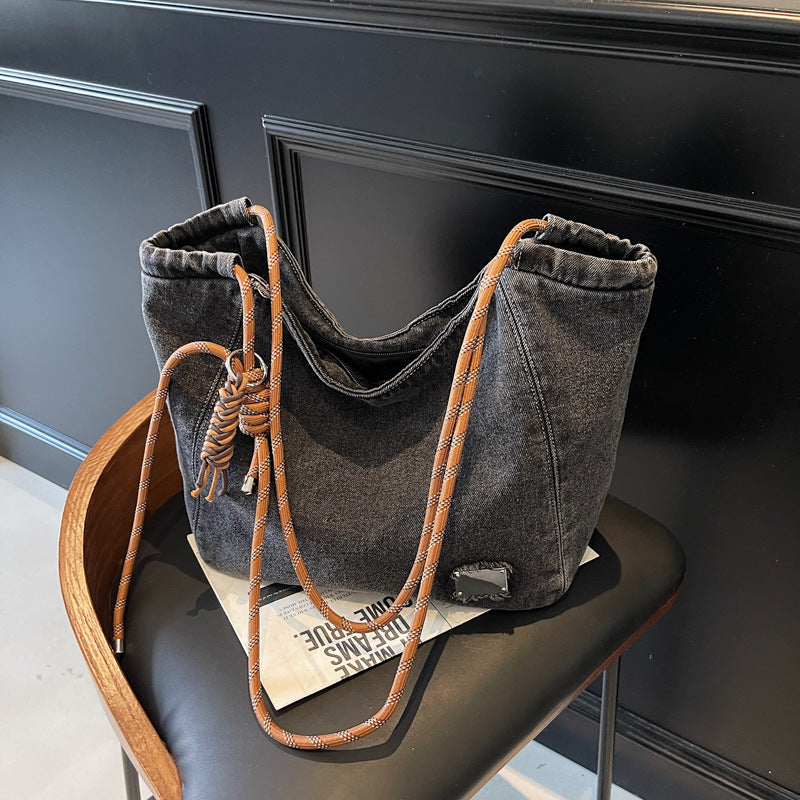 A denim shoulder bag
