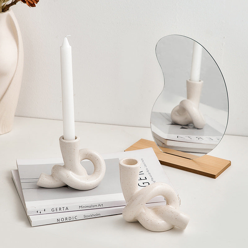 A ceramic candle holder ornament