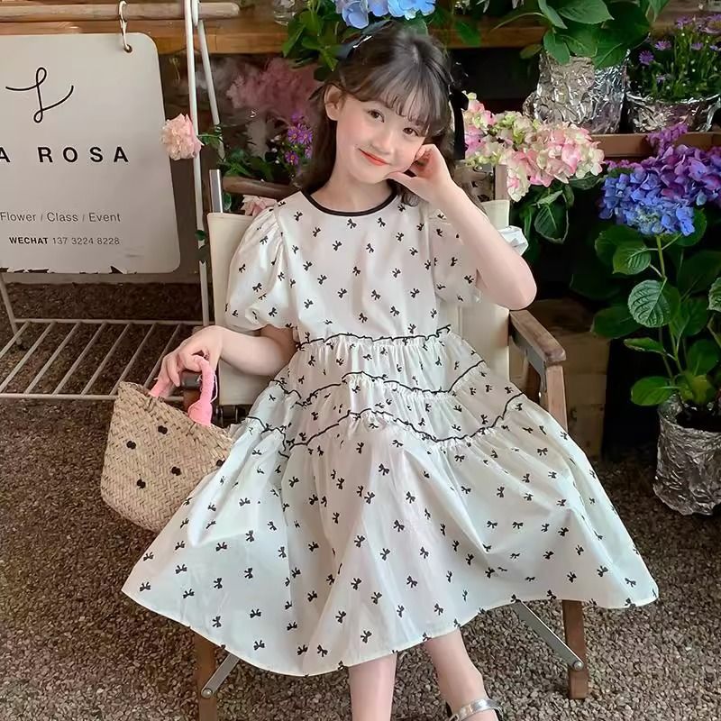 A children's dress summer new Korean version of foreign style princess dress girls middle and older children's bow bubble sleeve skirt tide