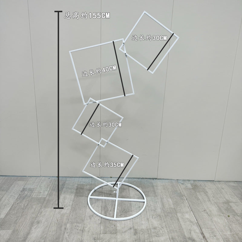 A wrought iron flower stand road guide