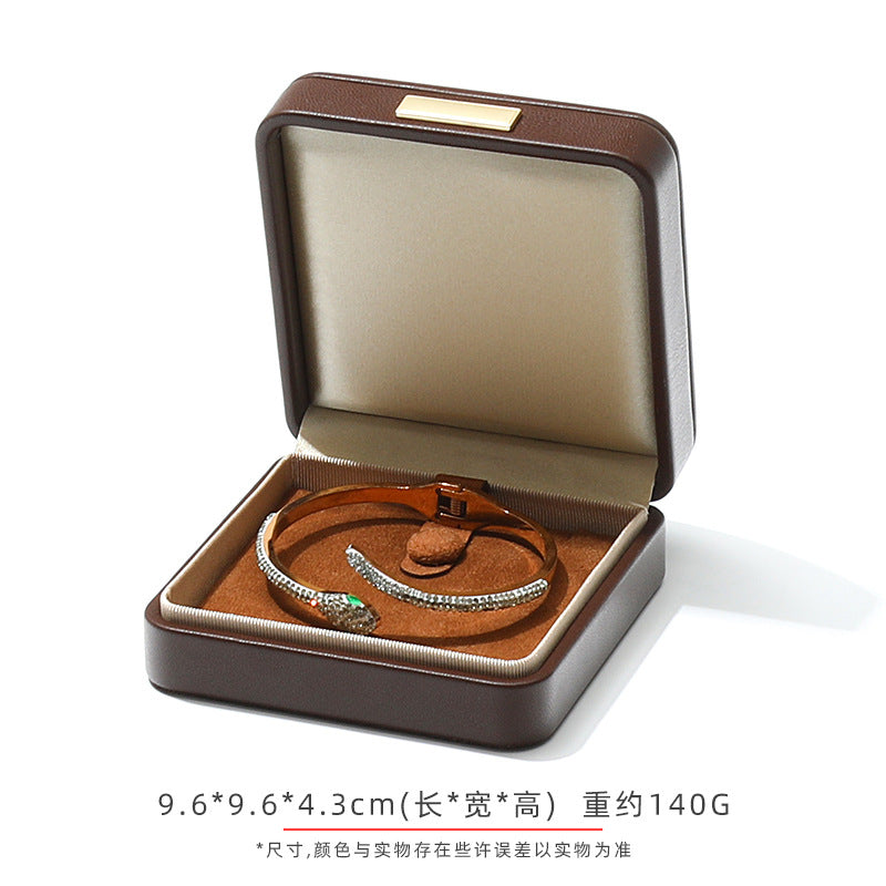 A Arched Leather Ring Jewelry Box