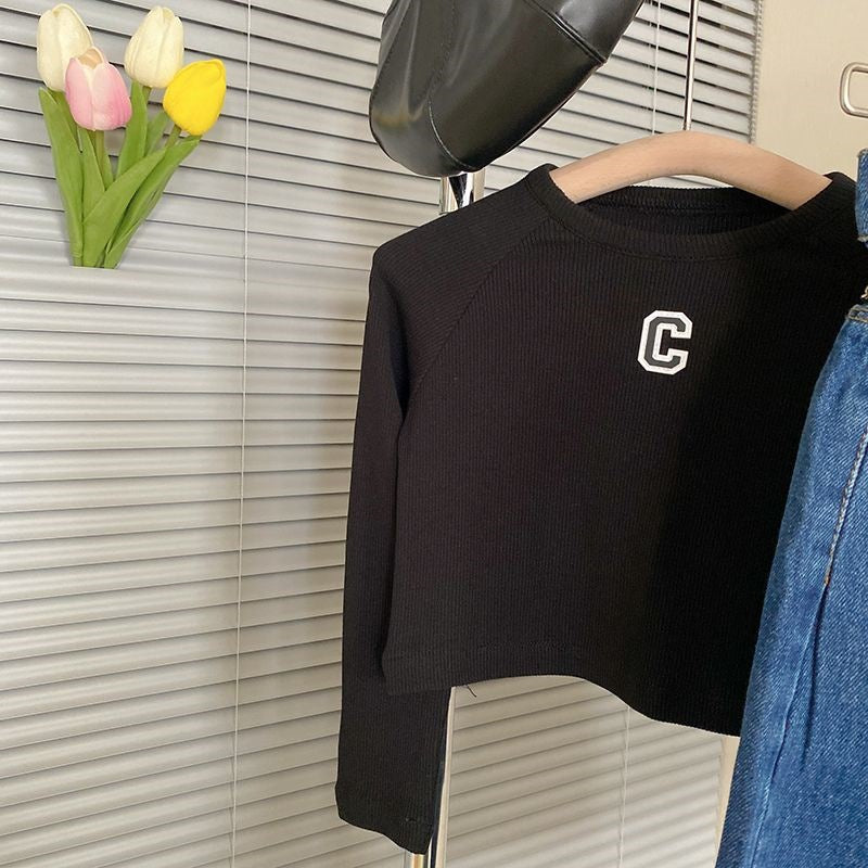 A girls' suit spring and autumn new girls' Korean version embroidered letter T-shirt top denim skirt knitted suit