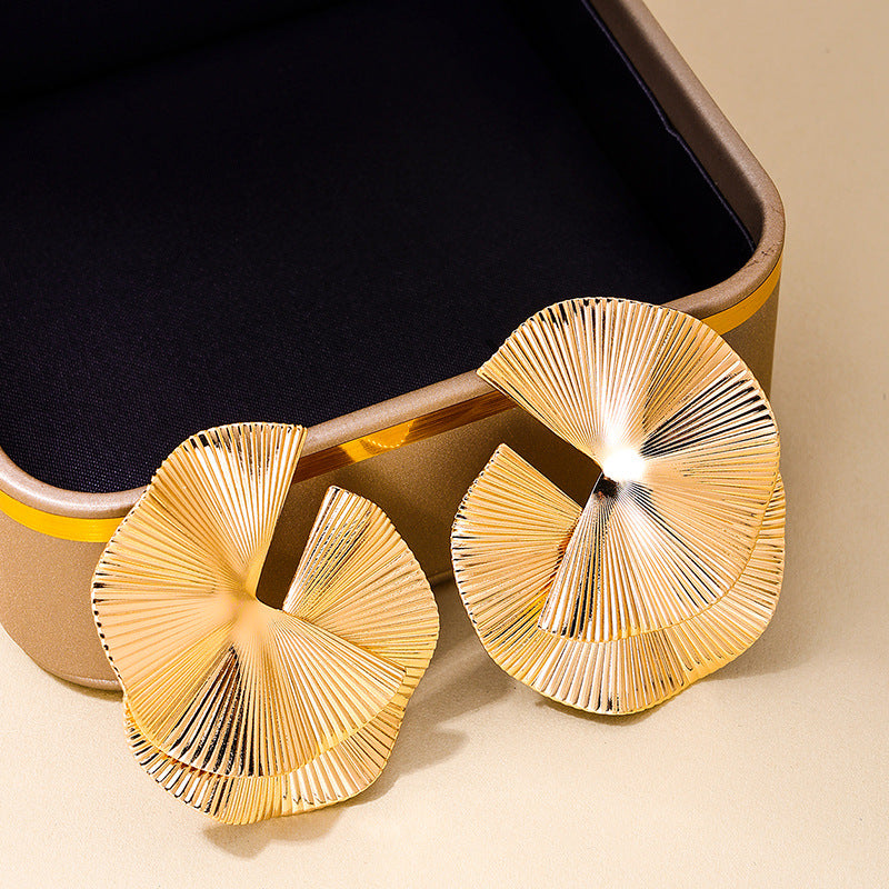 A Cross-border new twisted fan-shaped women's earrings European and American design sense fashion personality dinner stud earrings wholesale - Mixbatch