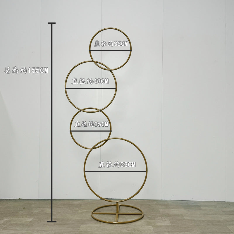 A wrought iron flower stand road guide