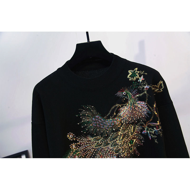 A sequined long sleeve suit