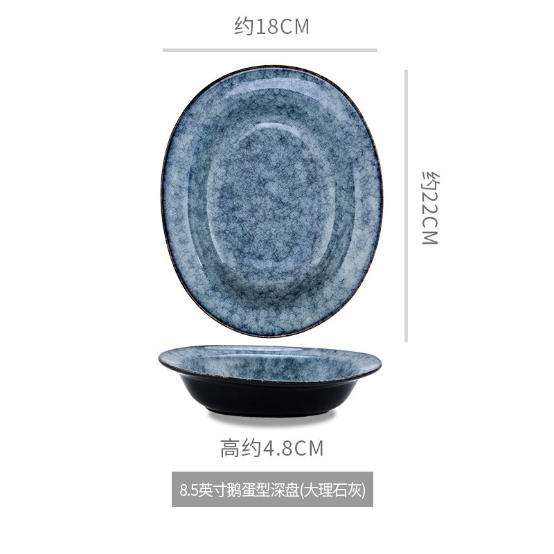 A Japanese creative goose egg-shaped ceramic plate vegetable plate household tableware simple western deep plate pasta plate salad plate