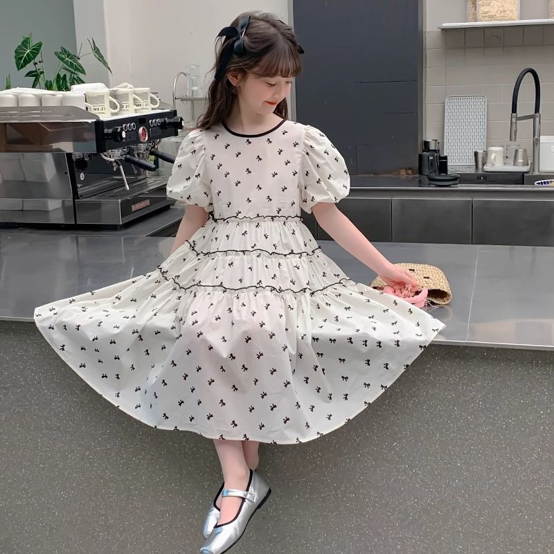A children's dress summer new Korean version of foreign style princess dress girls middle and older children's bow bubble sleeve skirt tide