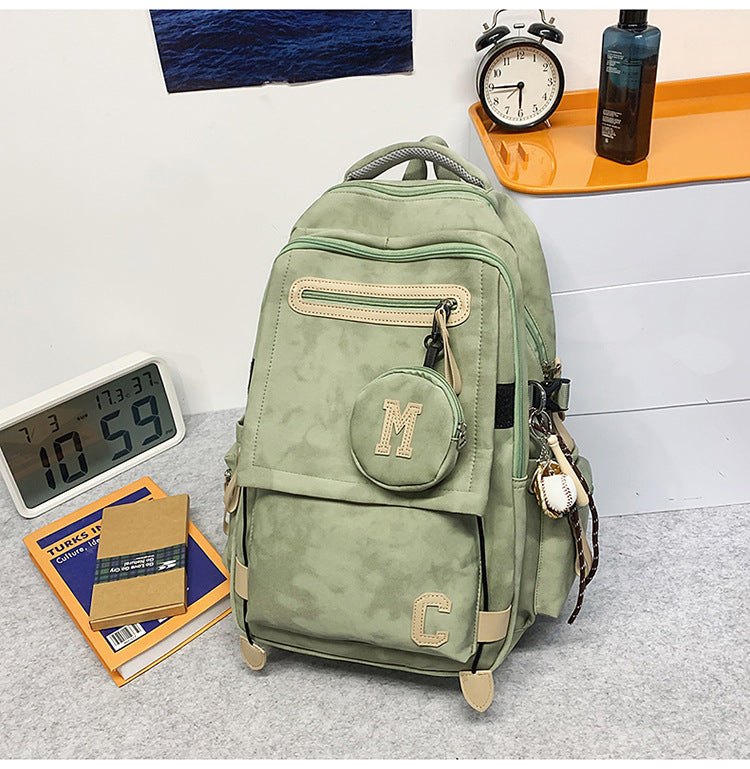 A Korean version ins new high-value solid color alphabet backpack couple casual simple lightweight large-capacity backpack
