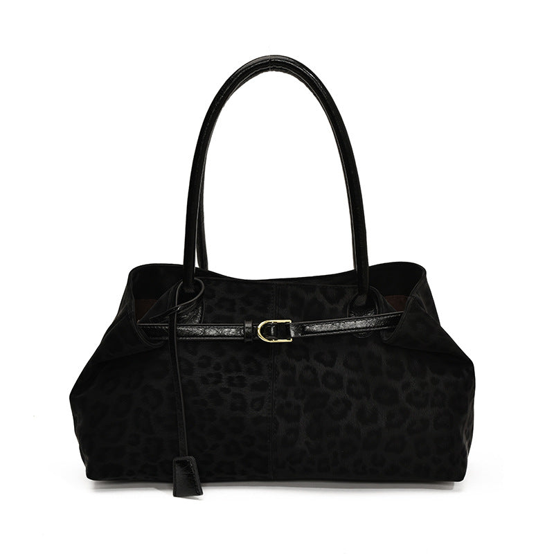 A handbag shoulder messenger bag