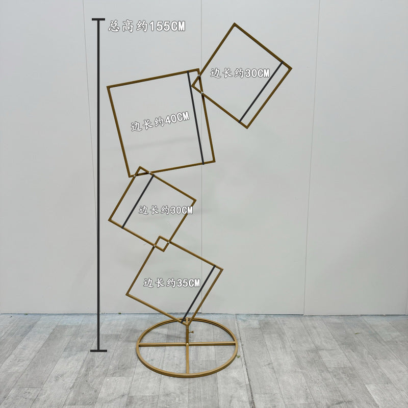 A wrought iron flower stand road guide
