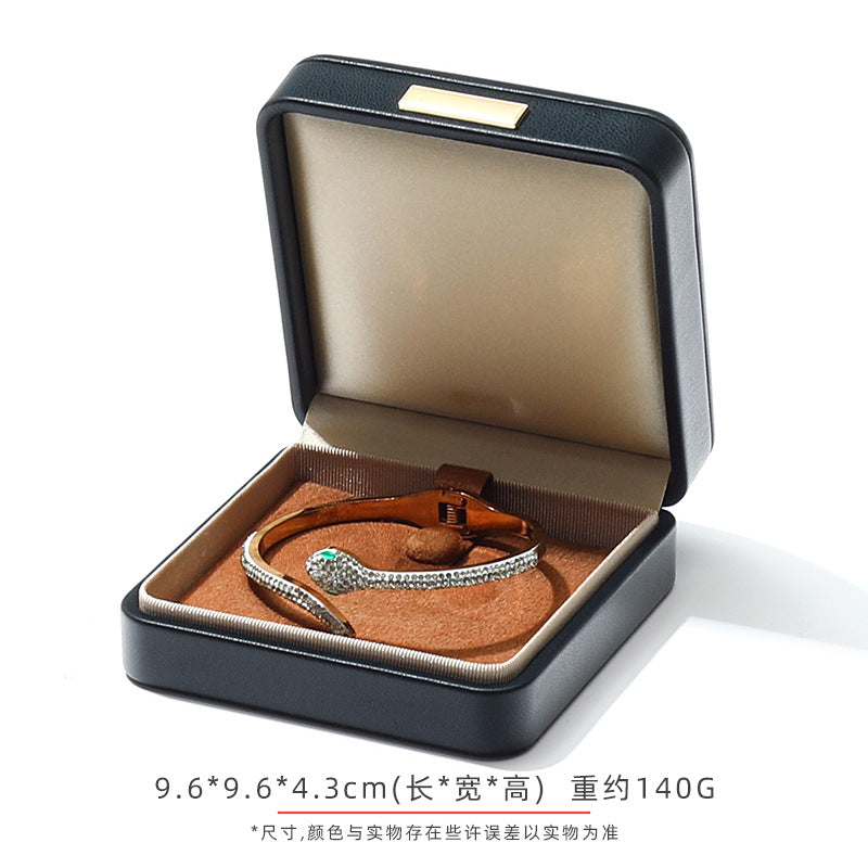 A Arched Leather Ring Jewelry Box