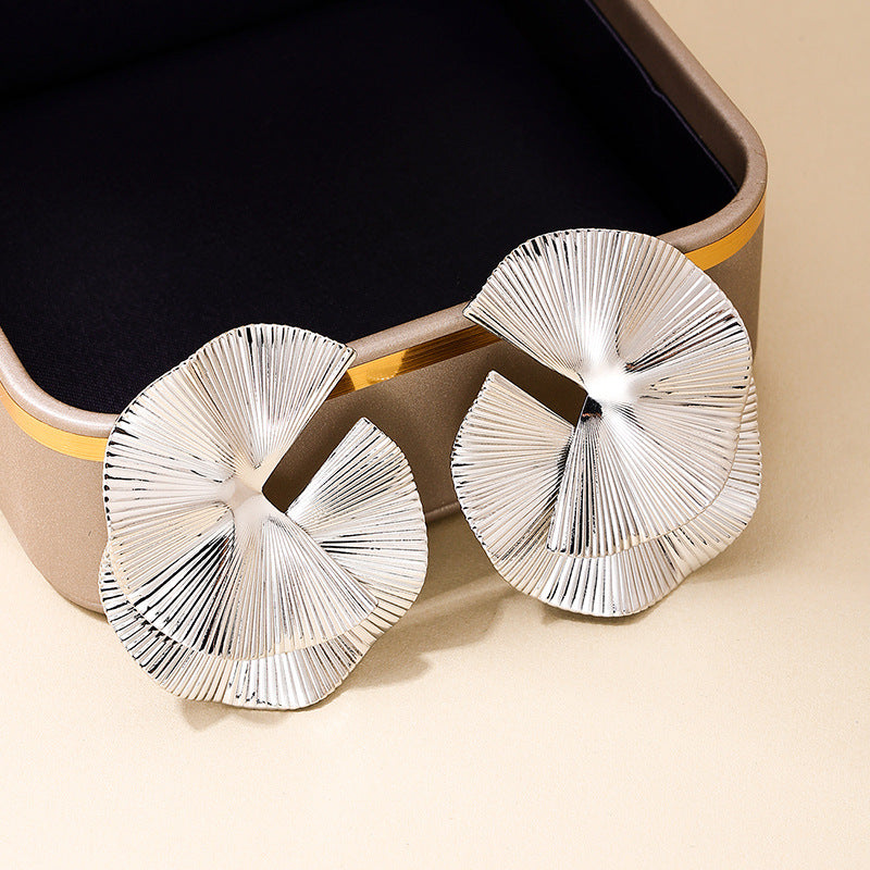 A Cross-border new twisted fan-shaped women's earrings European and American design sense fashion personality dinner stud earrings wholesale - Mixbatch