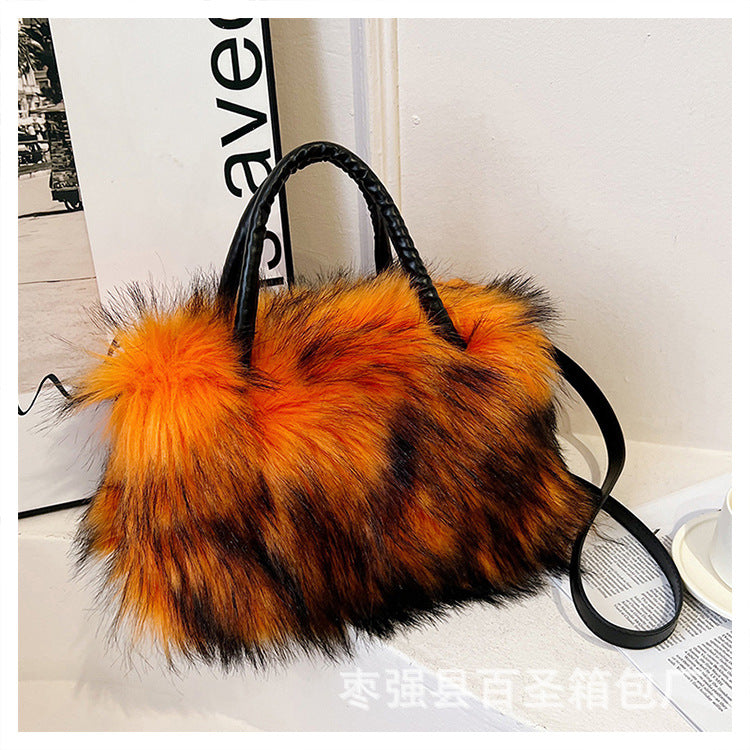 A Plush raccoon fur handbag