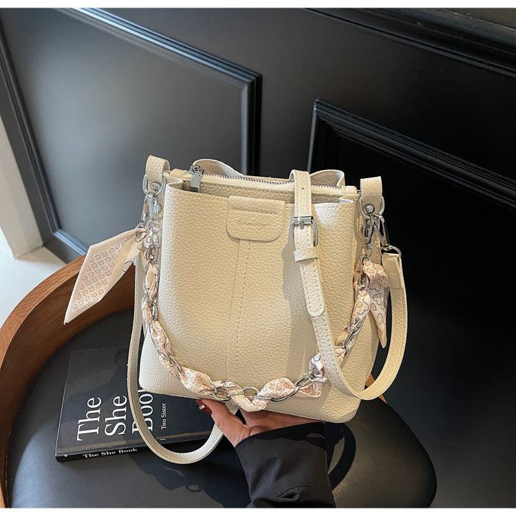 A handbag shoulder messenger bag