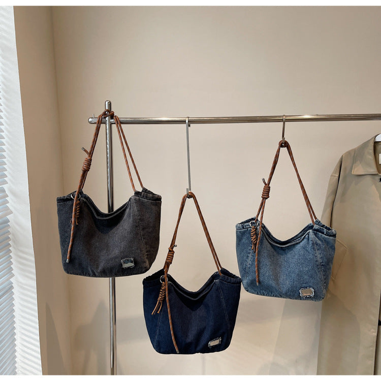 A denim shoulder bag