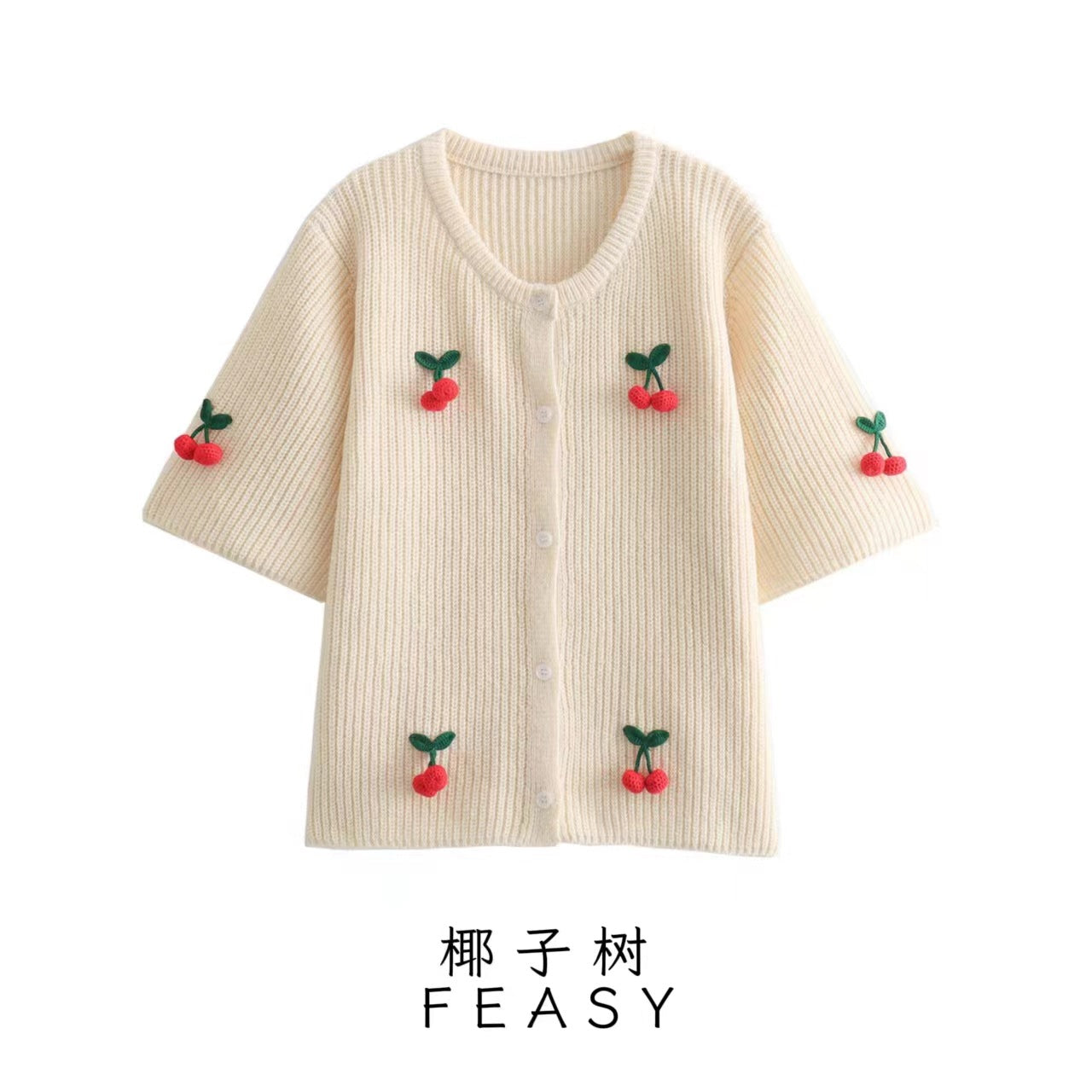 A cherry garnish sweater