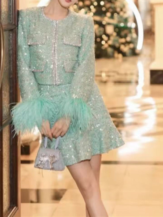 A sequined jacket skirt suit