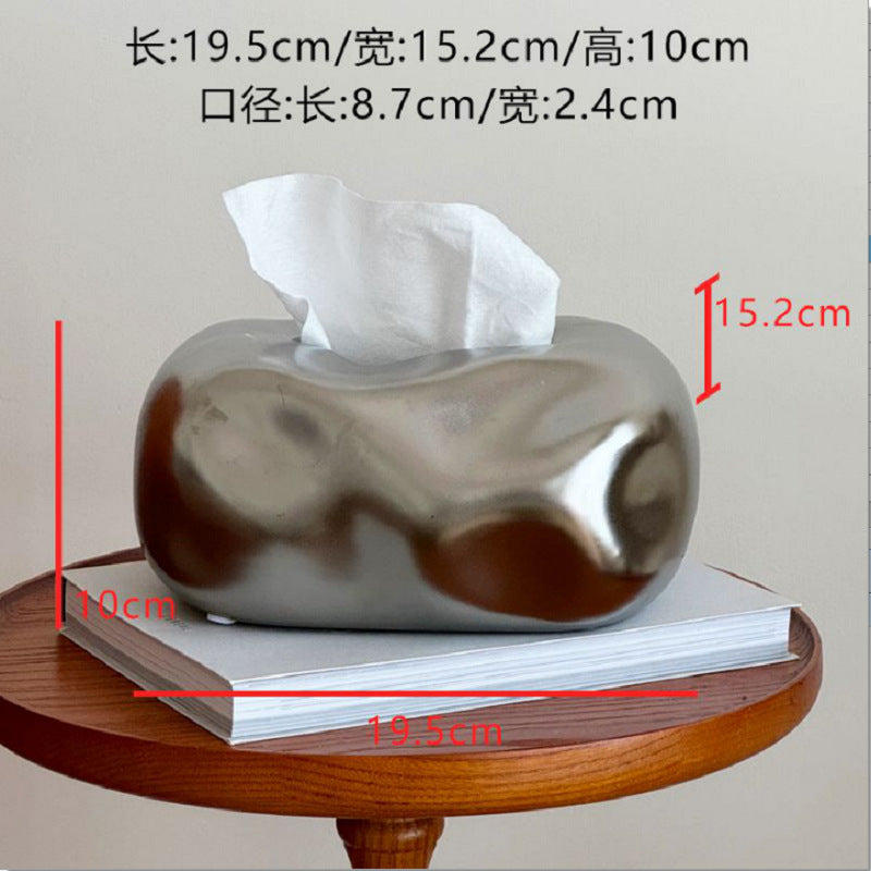 A ceramic tissue box ornament