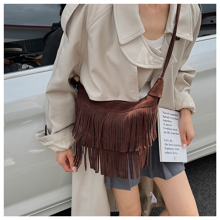 A fringed shoulder bag