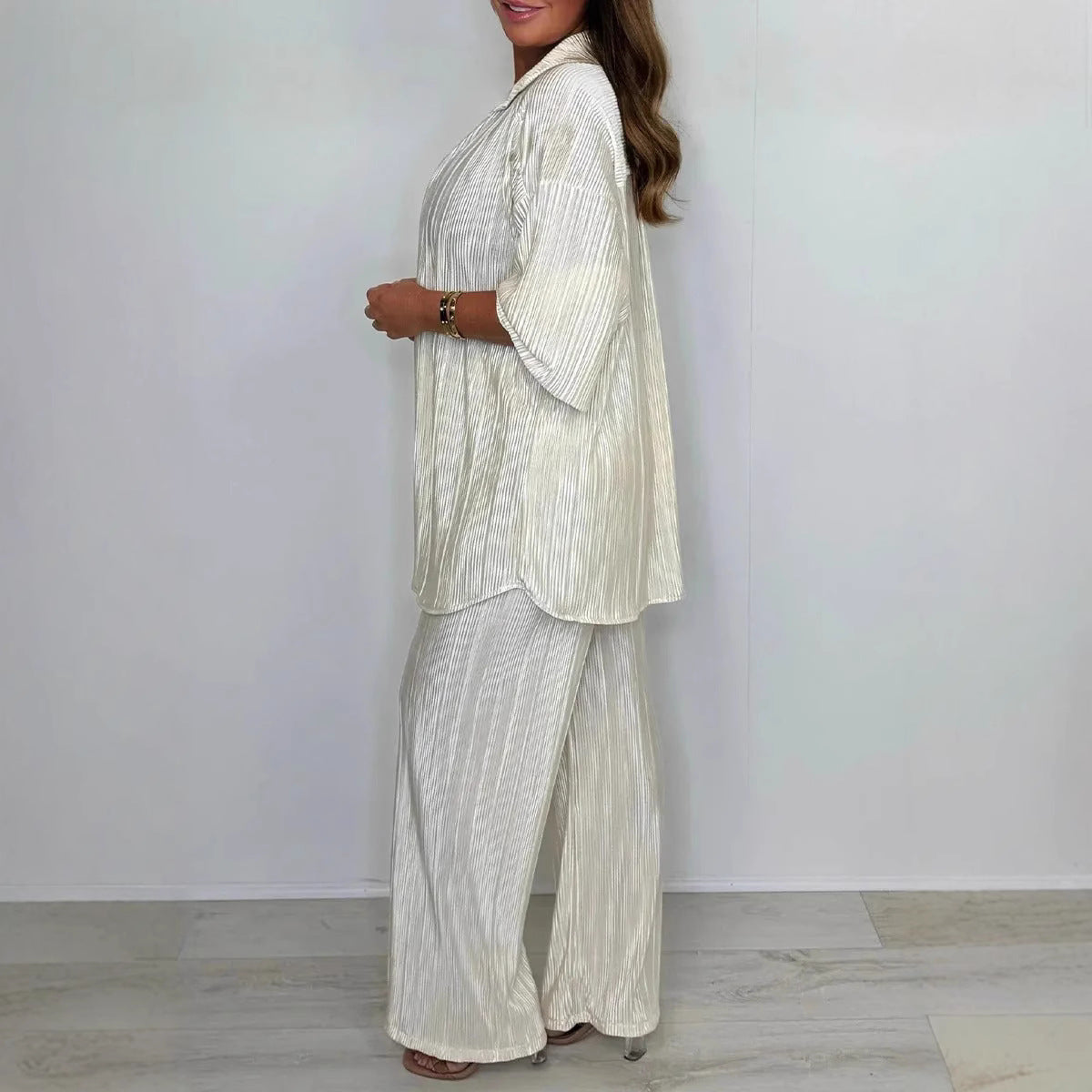 A European and American fashion women's clothing independent station lapel breasted loose long-sleeved pleated cardigan top trousers two-piece set