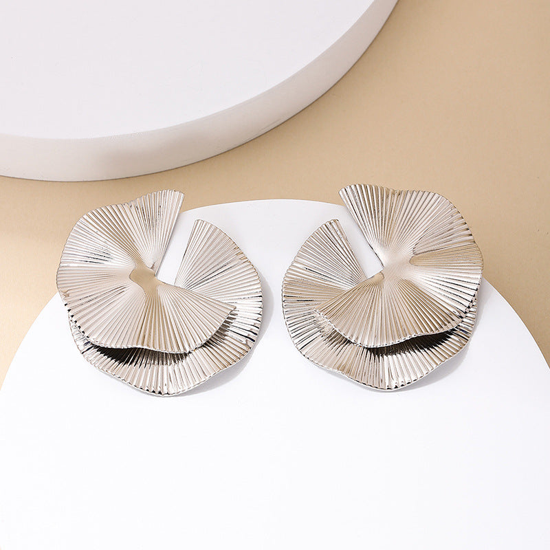 A Cross-border new twisted fan-shaped women's earrings European and American design sense fashion personality dinner stud earrings wholesale - Mixbatch