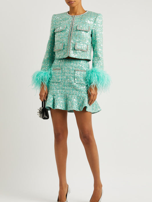 A sequined jacket skirt suit