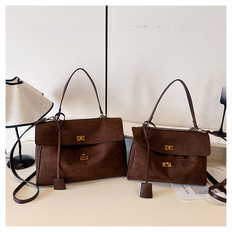 A suede shoulder bag