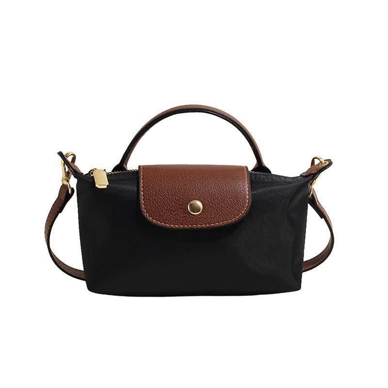 A new Oxford cloth women's bag fashion splicing dumpling bag simple handbag premium texture commuter bag