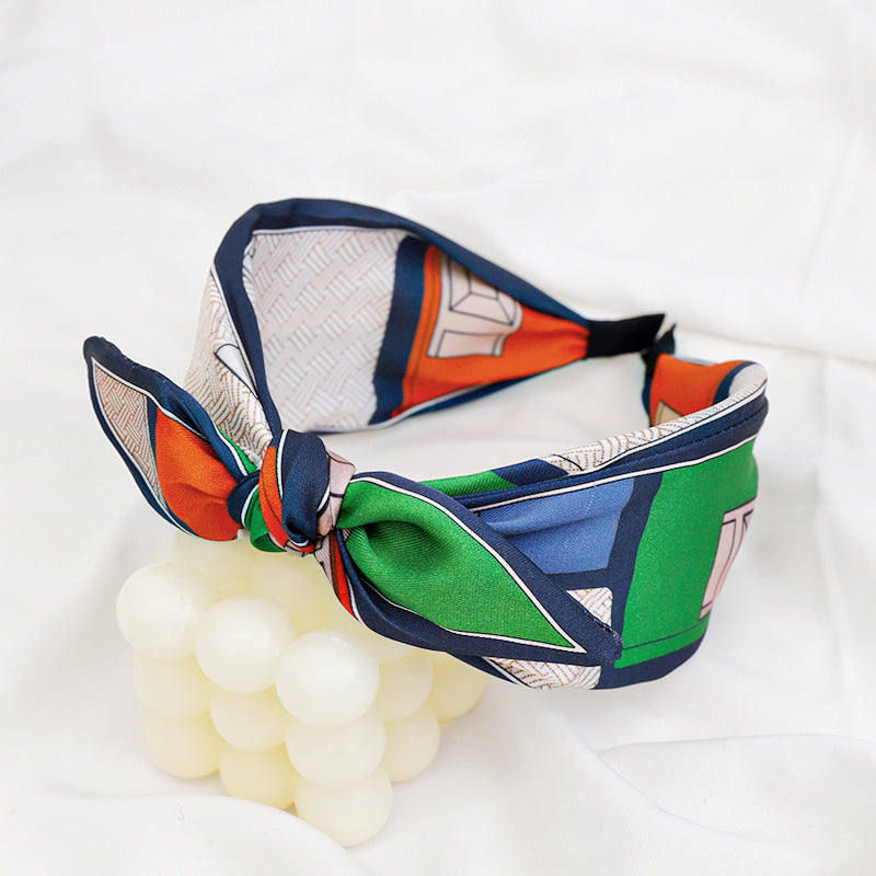 A Korean version of the new product headband fashion calico geometric wide edge headgear hair bundle go out bow hairpin