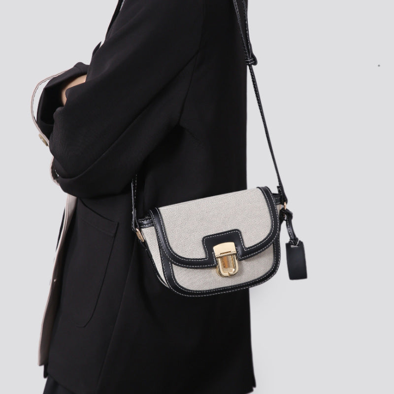 A autumn new Korean niche contrasting color single shoulder diagonal span saddle bag retro versatile underarm small bag women