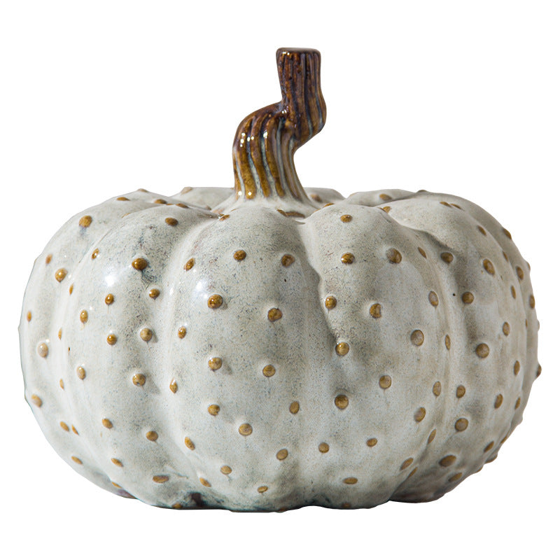 A ceramic pumpkin ornament