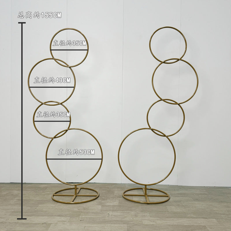 A wrought iron flower stand road guide
