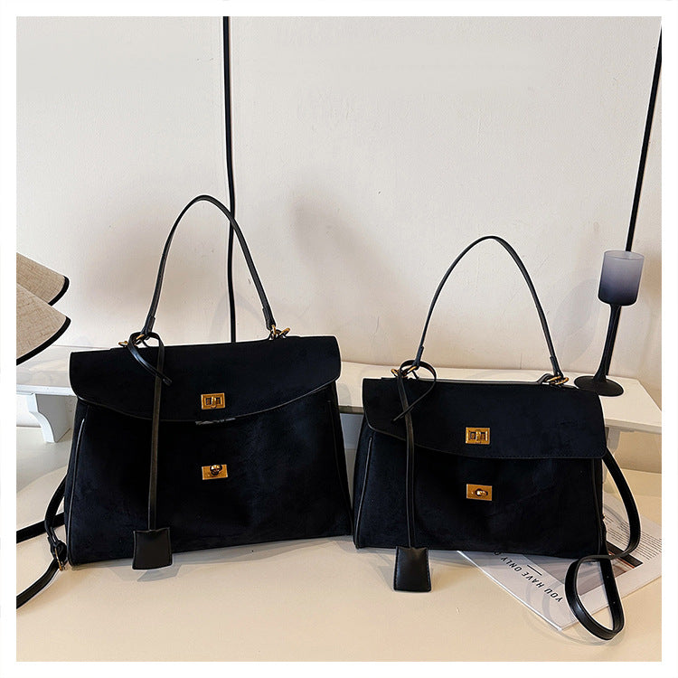 A suede shoulder bag