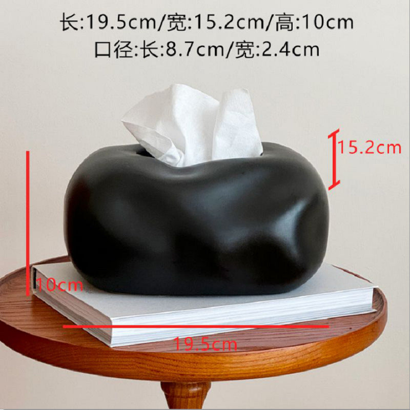 A ceramic tissue box ornament