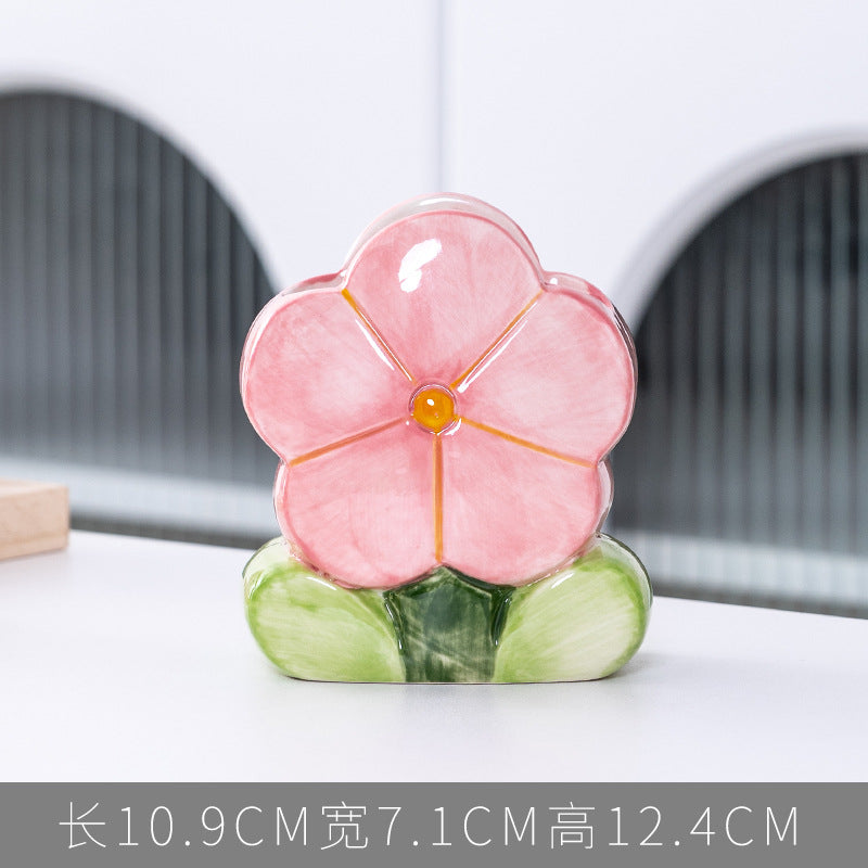 A ceramic pen holder storage ornament