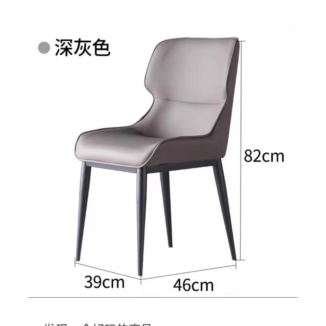 A wrought iron leather chair seat