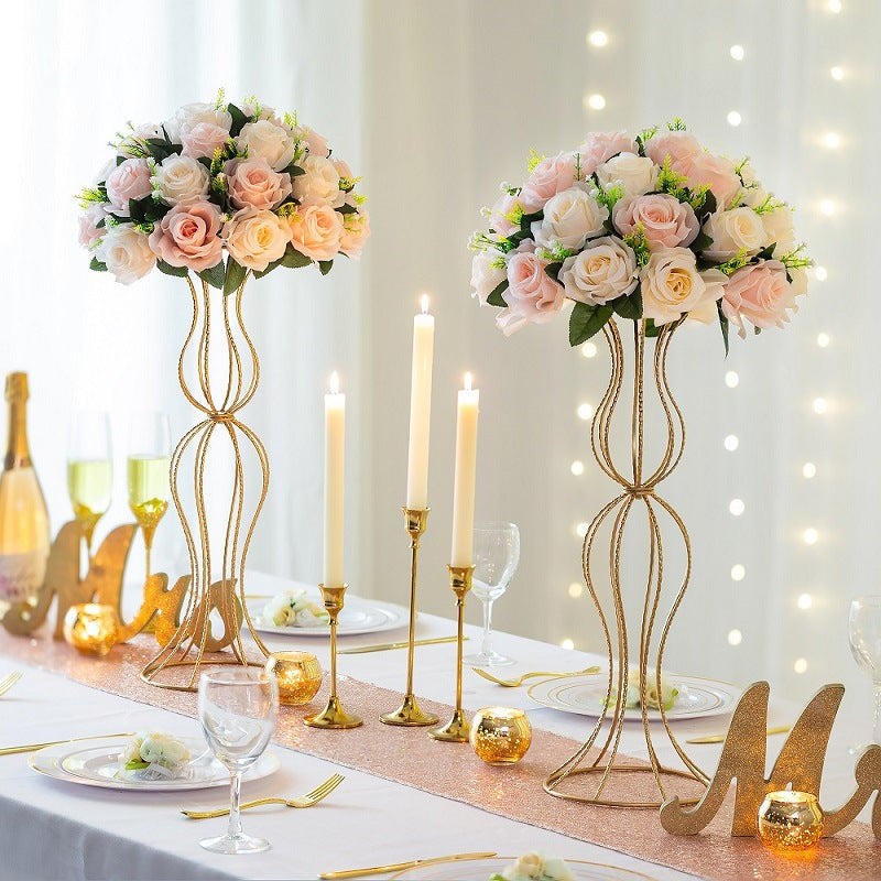 A flower stand banquet arrangement props