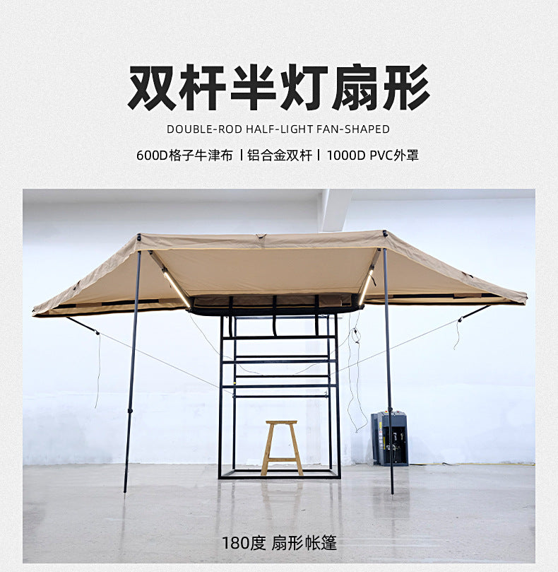 A double pole scalloped roof tent with lights